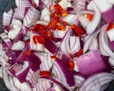 A picture of step 1 of Red onion chutney with nuts and raisins.