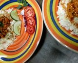 A picture of step 4 of Masala scrambled eggs with cumin rice.