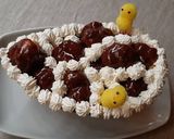 Foto del passaggio 6 della ricetta Uovo di pasqua ripieno con bignè al cioccolato
