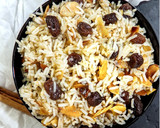 Foto del paso 4 de la receta: Arroz especiado con almendras y pasas