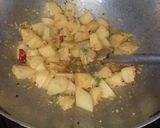 A picture of step 8 of Aloo posto.