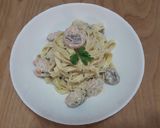 Pas rețetă Tagliatelle cu creveți, ciuperci și smântână 9 fotografie