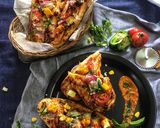 A picture of step 14 of Paneer tikka naan pizza.