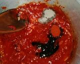 A picture of step 4 of Honey and ketchup glanced chicken drumsticks.