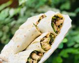 A picture of step 9 of Tortilla chicken wrap.