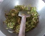 A picture of step 3 of Lau Khosa Posto Bhaja aka Roasted Bottle Gourd Peel.