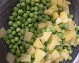 A picture of step 1 of Matar Poha.