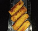 A picture of step 8 of Cheesy Kabab Bread Roll.