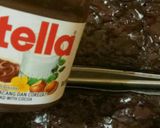 Foto langkah ke 7 dari resep Brownies Shiny Crust topping Nutella.