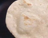 A picture of step 2 of Mexican taco In Indian style.