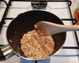A picture of step 6 of Rice and Chicken soup.