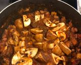 A picture of step 7 of Venison, mushroom and borlotti bean stew 🦌 🍄.