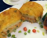 A picture of step 9 of Chicken stuff potato sandwich.