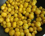 A picture of step 4 of Baby Potato Curry with Green Peas.