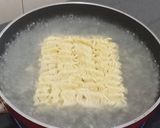 Foto langkah ke 1 dari resep Indomie goreng keju.