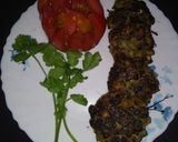 A picture of step 7 of Sajne fuler Bora (drumsticks flower fitters).