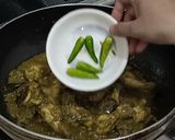 A picture of step 6 of Green Masala Chicken Curry.