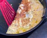 Une image de l'étape 2 de Omelette roulée au fromage.