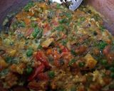 A picture of step 4 of Egg Bhuji with veggies.