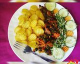 A picture of step 14 of Fried potato, chicken sauce and salad.