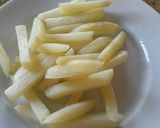 A picture of step 7 of Crispy Homemade Fries.