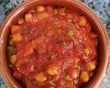 Foto del paso 9 de la receta Cazuela vegetariana de garbanzos con tomate y huevos poché