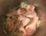 A picture of step 3 of Chicken Arroz Caldo.