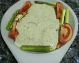 Foto del paso 7 de la receta Salmón al horno con pesto y verduras