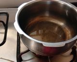 A picture of step 1 of Aloo chorifali and tomato sabji.