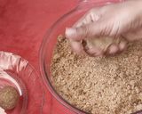 A picture of step 3 of Moong fali Til Ladoo.