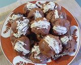 Foto del passaggio 5 della ricetta Biscotti natalizi con mandorle, cacao, miele e cannella