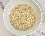 Foto del paso 1 de la receta: Arroz con nata, pollo y arándanos rojos