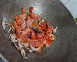A picture of step 2 of Dosa with tomato onion chutney.