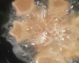 A picture of step 4 of Jaggery mithery.