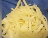 A picture of step 3 of Potato kurkure fries.