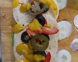 A picture of step 4 of Homemade Chicken Salami sandwich in Subway style.