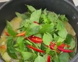 A picture of step 1 of Pork Neck Green Curry.