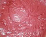 A picture of step 4 of Red Velvet çhoçolate inside Cupcakes with cream cheese frosting.