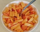 A picture of step 3 of Muskmelon and papaya salad.