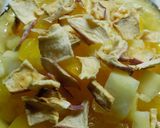 Foto del paso 4 de la receta: Ananá rellena con ensalada de frutas
