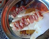 A picture of step 16 of Grilled Pork Skewers with Fresh Coconut Milk (10 Baht per Skewer).