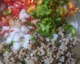 A picture of step 2 of Leftover makeover millet mango chaat bite.
