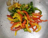 A picture of step 6 of Multigrain methi thepla roll with bell pepper & paneer stuffing.