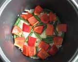 A picture of step 6 of Paella Inspired Seafood Takikomi Gohan.