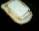 A picture of step 2 of Egg cheese sandwich Egg.