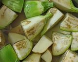 A picture of step 1 of Jowar Bhakri with brinjal potato vegetable curry.