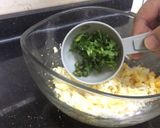 A picture of step 6 of Egg-cheese salad in bread cups.
