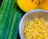 A picture of step 1 of Torai & kaddu with chana dal (Ridge gourd & pumpkin with split chick peas).