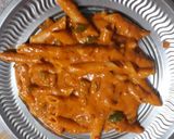 A picture of step 14 of Creamy and Spicy Schezwan Pasta.