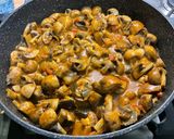 A picture of step 17 of Eggplant Curry with Mushrooms, Tomatoes, and Coconut Milk.